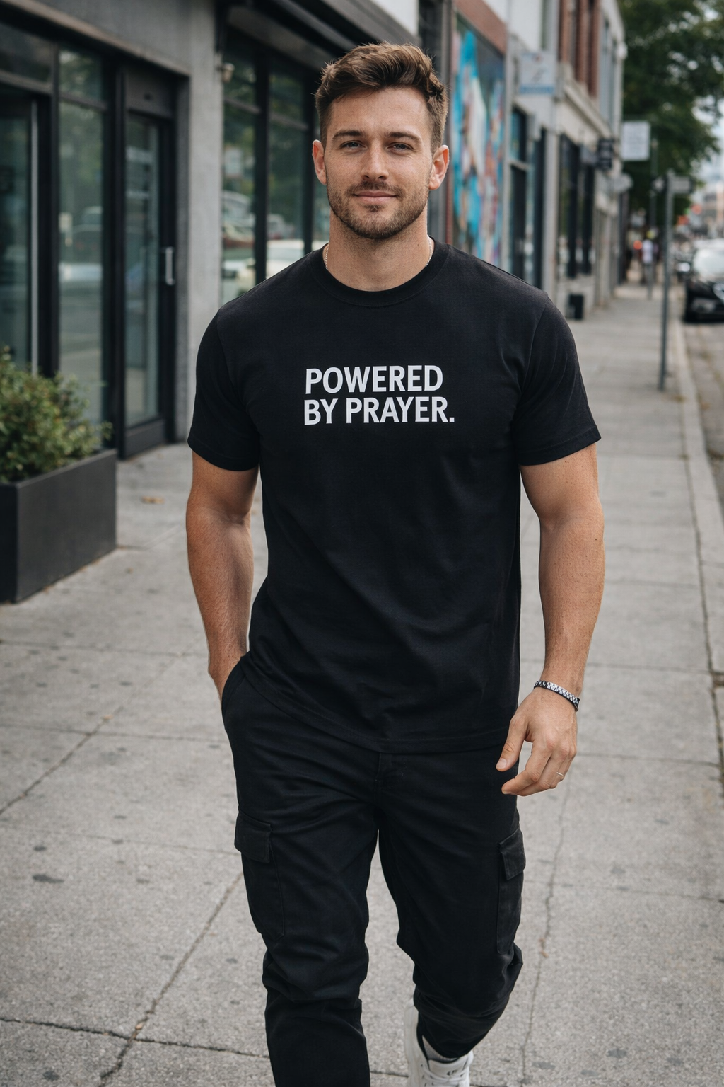 POWERED BY PRAYER Tee